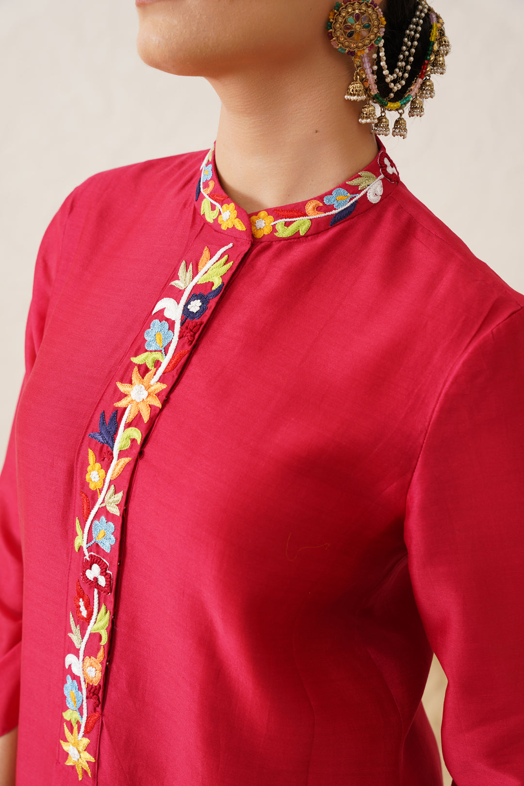 Red multi coloured embroidered kurta set