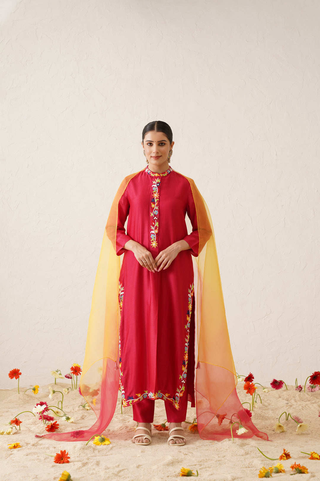Red multi coloured embroidered kurta set